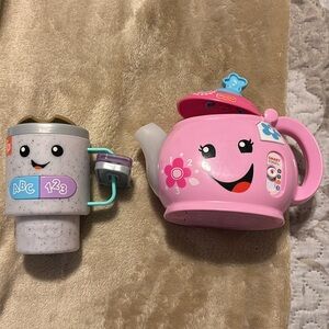 Fisher-Price Laugh & Learn Wake Up & LearnMug sings talks lights up & teapot